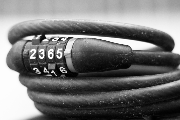 Photo of a bicycle lock with a four-digit combination.